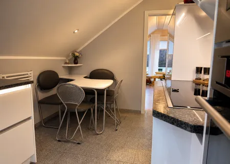 Kleine Essecke in der Küche der Ferienwohnung Am Wäldchen
